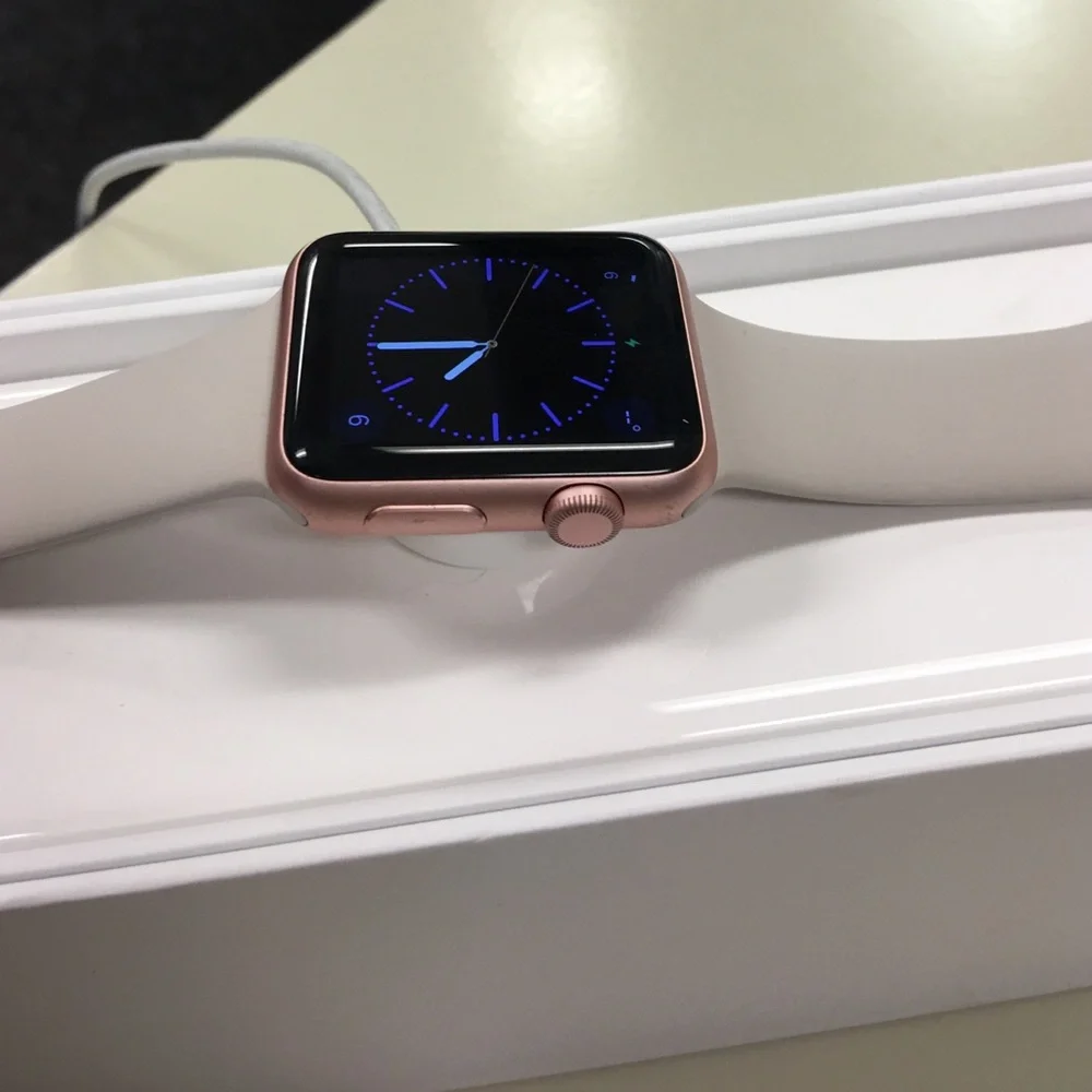 Apple Watch 42mm Rose Gold Smartwatch with Light Beige Silicone Strap